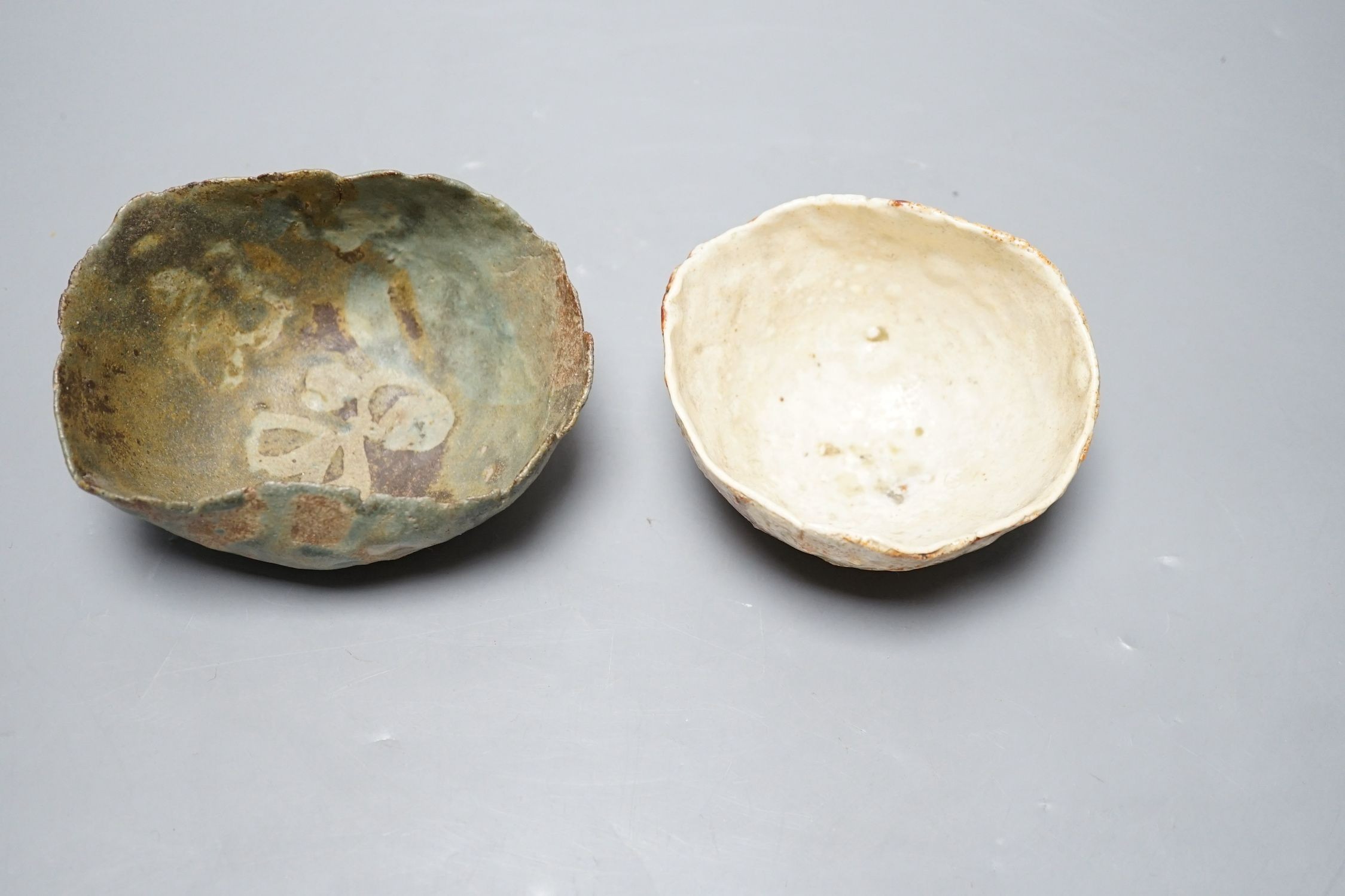 Ewen Henderson (1934-2000), two hand-built mixed laminated clay dishes, largest 12.5cm wide